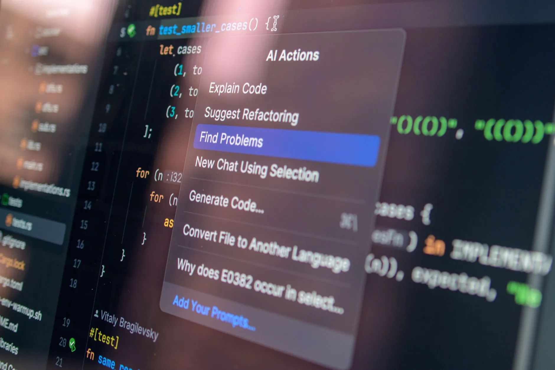 Developer pointing at AI-generated code on a monitor