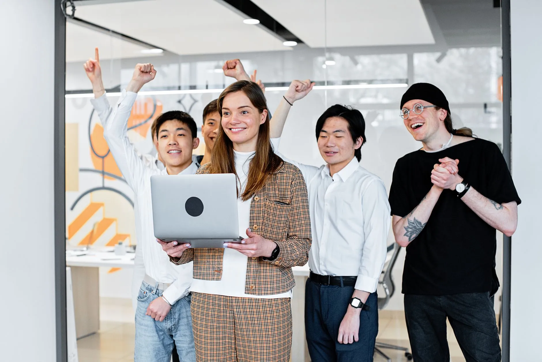 Team celebrating a successful website launch together